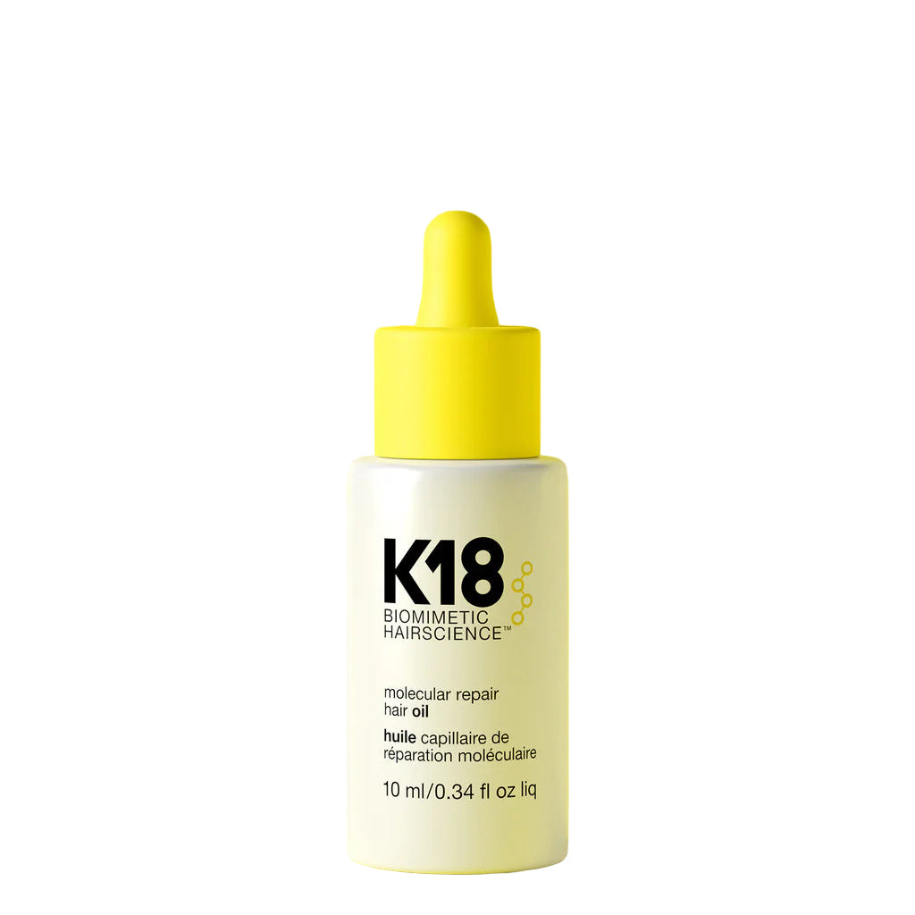Aceite K18 Reparador Molecular 10 ml. Controla el frizz, repara el daño interno y brinda protección térmica.