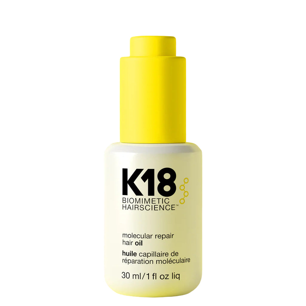 Aceite K18 Reparador Molecular 30 ml. Controla el frizz, repara el daño interno y brinda protección térmica.
