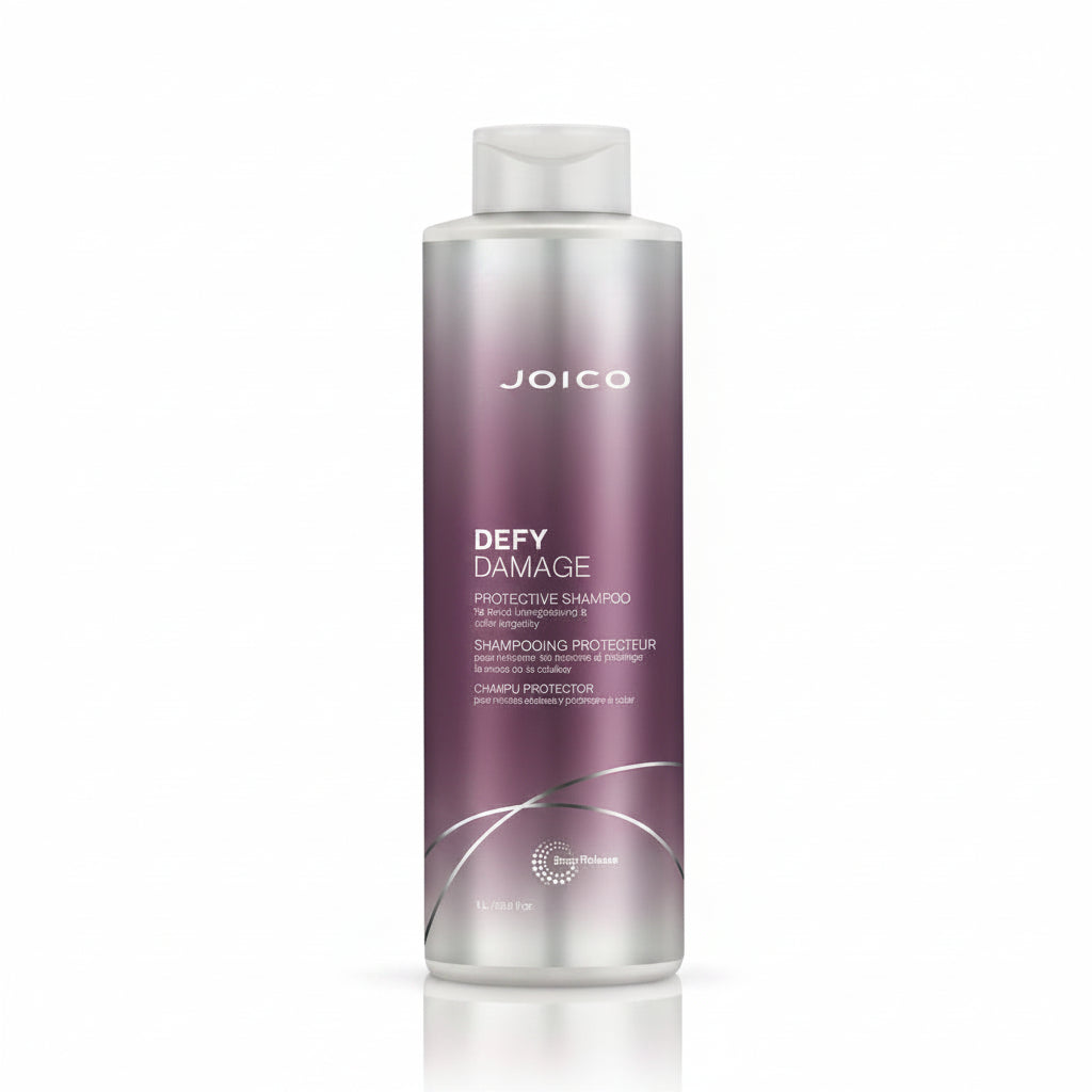 Joico Defy Damage Shampoo 1 Litro — Champú reparador y protector del color para cabello teñido y tratado