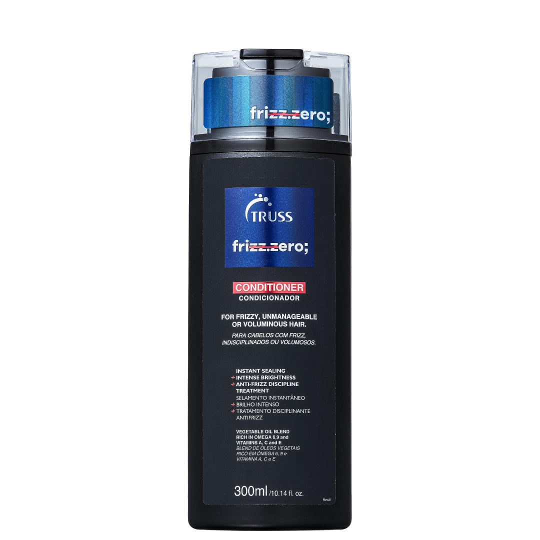 Textura cremosa del acondicionador TRUSS Frizz Zero, fórmula ligera diseñada para desenredar y suavizar el cabello al instante.
